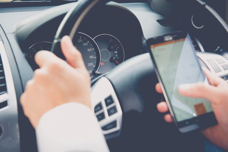 Drivers using mobiles to face tougher penalties