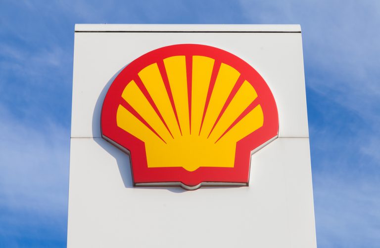 Shell to set carbon targets, shares rise
