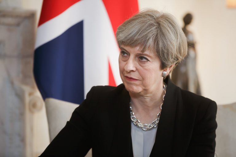May has “absolute determination to deliver Brexit”