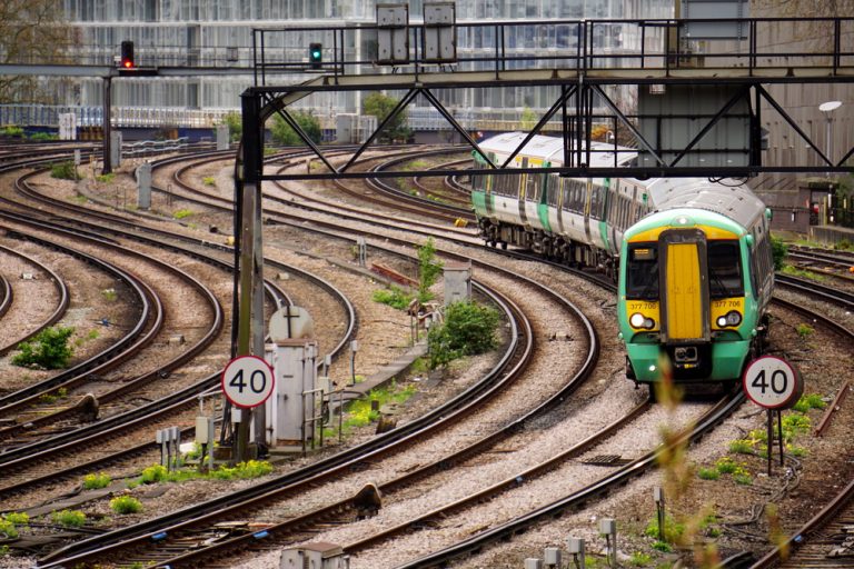Osborne calls on May to back rail plans