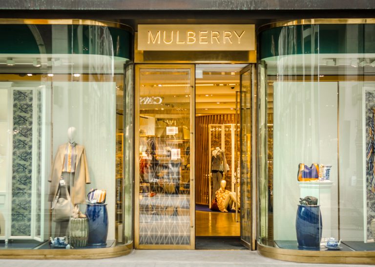 Mulberry posts deeper half year loss, shares down
