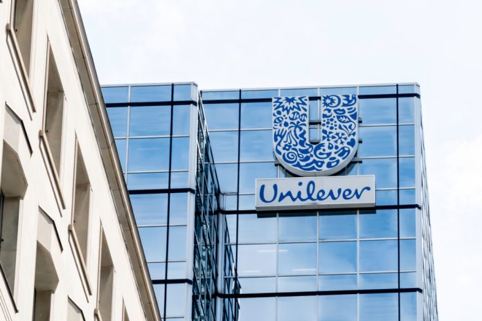 Unilever warns on sales, shares down